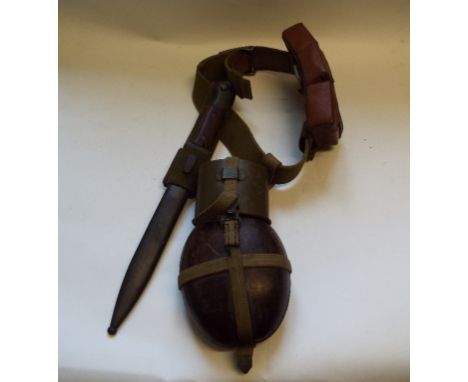 A German World War II Infantryman's belt, with buckle, attached with a bayonnet, scabbard, leather ammunition pouches, and a 