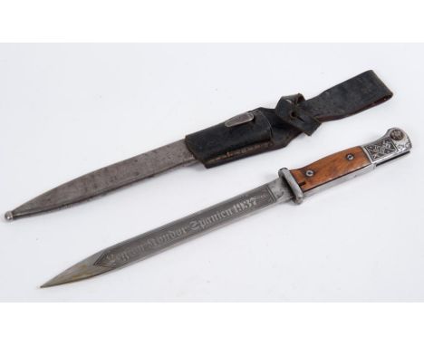 A German ceremonial type bayonet, the blade stamped 4597 d, and S/173K, and engraved Luftwaffe Jagdgruppe 88 to one side, and