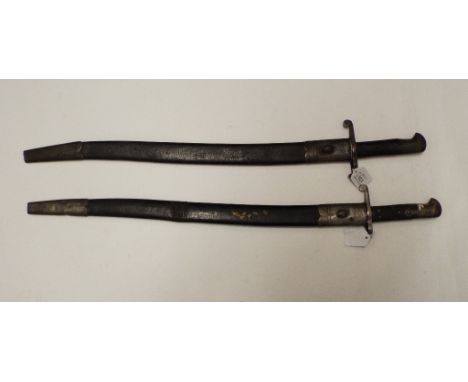 A bayonet, with a scabbard, and another similar (2)