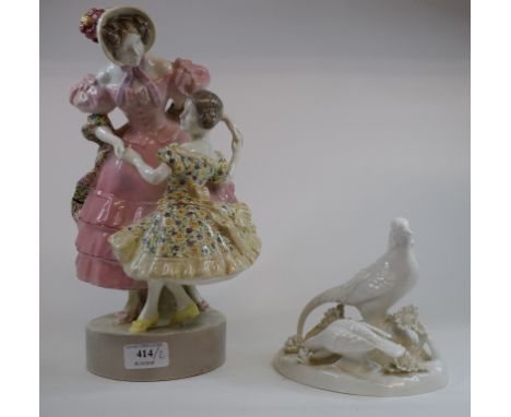 An Austrian Goldscheider group, of a lady and girl dancing (cracked), 31 cm high and a Staffordshire group, of two pheasants,