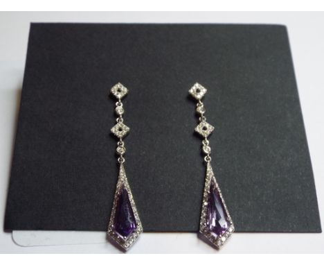 A pair of 18ct white gold, amethyst and diamond drop earrings