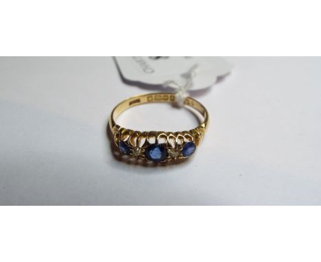 An 18ct gold, sapphire and diamond ring, approx. ring size R