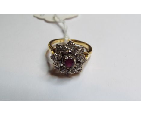 An 18ct gold, ruby and diamond flowerhead ring, approx. ring size N½