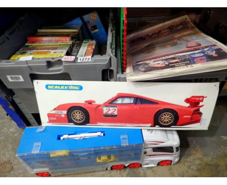 Shelf of mixed toys and train VHS. Not available for in-house P&amp;P 