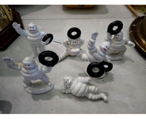 Set of six cast iron Michelin men, H: 90 mm. UK P&amp;P Group 1 (£16+VAT for the first lot and £2+VAT for subsequent lots) 
