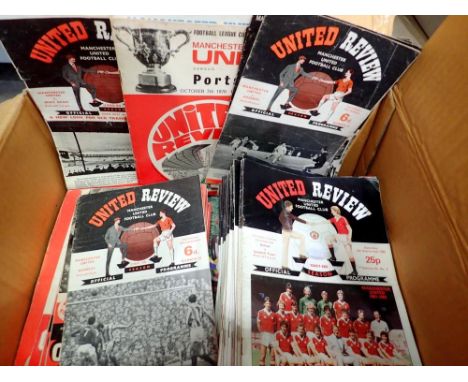 A large quantity of United Review and Manchester United programmes. UK P&amp;P Group 3 (£30+VAT for the first lot and £8+VAT 