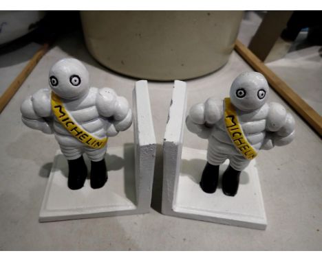 Cast iron Michelin Man bookends, H: 13 cm. UK P&amp;P Group 2 (£20+VAT for the first lot and £4+VAT for subsequent lots) 