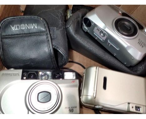 Three cased cameras, Nikon, Pentax and Minolta. Not available for in-house P&amp;P 