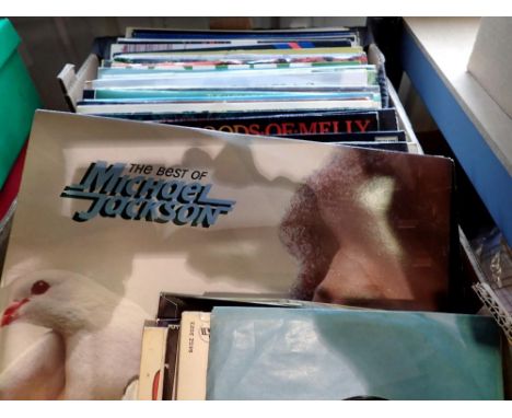 Box of mixed genre LPs including Abba and Michael Jackson. Not available for in-house P&amp;P 