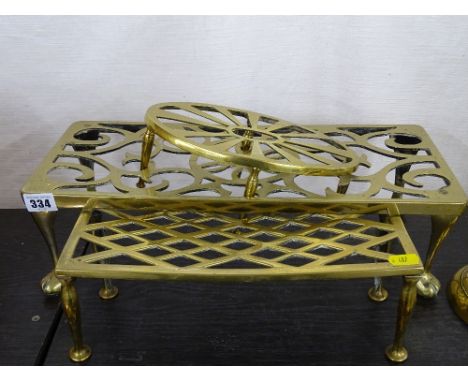Two oblong and one oval brass teapot/kettle stands
