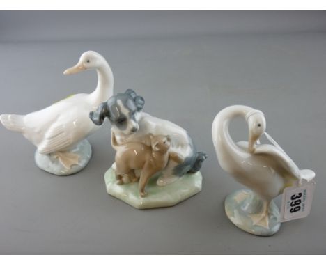 Lladro goose and two Nao figurines - goose and dog with cat (chip to ear of cat)