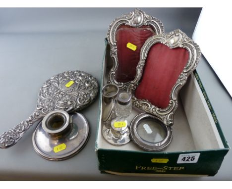 Pair of well shaped silver easel portrait frames (glass on one loose - beware!), a silver backed dressing table mirror, silve