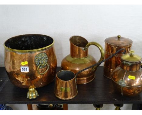 Five items of copperware including a tea caddy, good planter stand with three brass supports and lion's ring handles, cider j