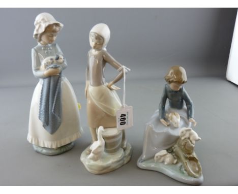 Lladro figurine of young girl with goose and bucket, two Nao figurines - young seated girl with pet rabbits and young standin