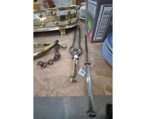 A good George III pair of ember tongs
With spirally turned slender handle, bell top, spirally turned and chisel decorated and