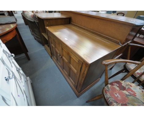 An Ercol elm two door side cabinet 
