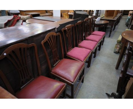 A Set of four 19th century mahogany country Chippendale style dining chairs with interlaced splat backs and a pair of fruitwo