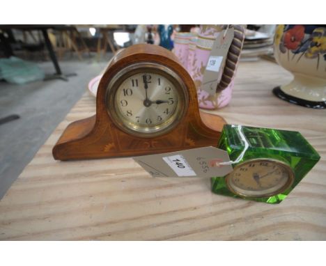 An Edwardian inlaid mantel clock and a green glass mantel clock. (2)
