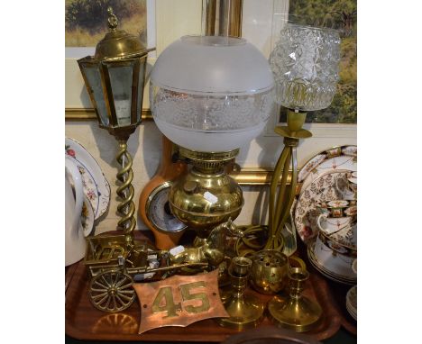 A Tray of Brassware to Include Horse and Trap Ornament, Candle Sticks, Oil Lamp, Table Lamps etc 