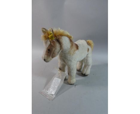 A Steiff Donkey with Button, 24cm high 