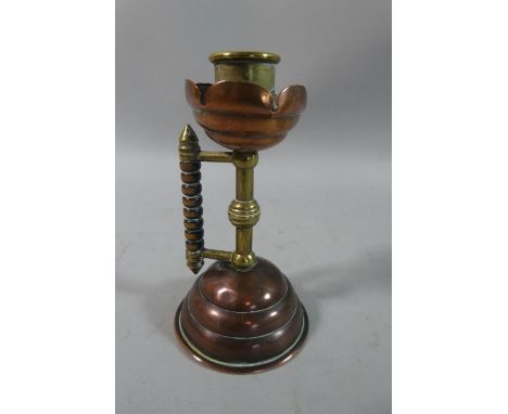 A Small Copper and Brass Chamber Stick After Christopher Dresser, 12.5cm High 