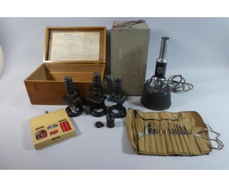 A Vintage Metal Cased Baker of London Microscope Together with Three Small Field Microscopes, Slides and Tools, Permanent Mag