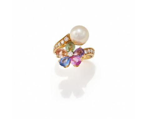 BULGARI, A CULTURED PEARL, COLOURED SAPPHIRE AND DIAMOND 'CONTRAIRE' RING Of crossover design, one terminal set with a 9.9mm 