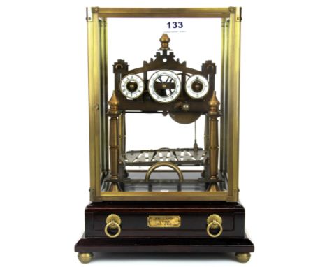 A four glass cased rolling ball Congreve style skeleton clock with bevelled glass panels, 39 x 27 x 27cm.