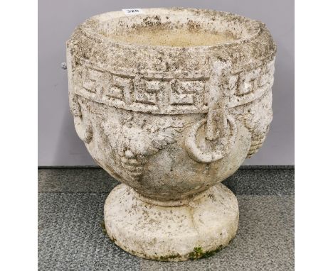 An antique carved sandstone garden planter, H. 39cm.
