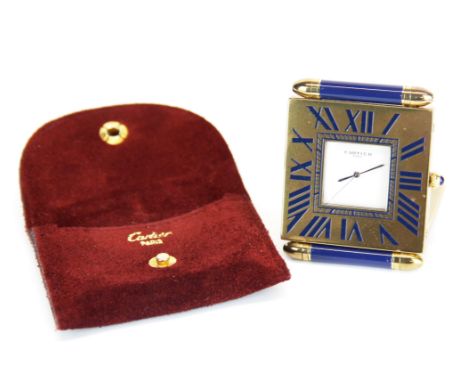 A lovely enamelled Cartier quartz travel clock with leather carrying pouch, clock size 5 x 6cm.