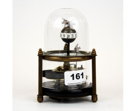 A Chinese skeleton clock with enamelled lotus decoration, H. 14cm.