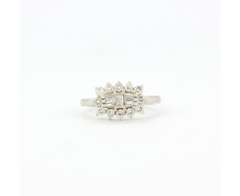 A hallmarked ring set with baguette and brilliant cut diamonds, (M).