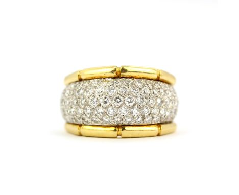An 18ct yellow and white gold ring pave set with brilliant cut diamonds,  (O).