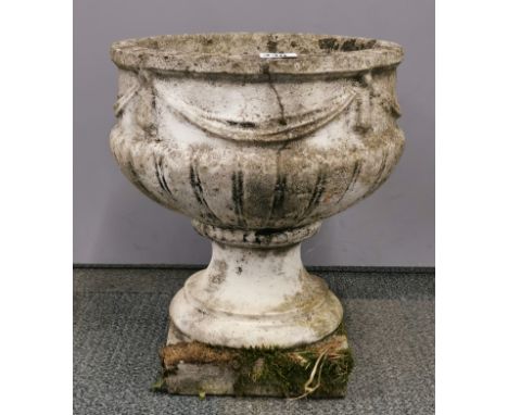 An old concrete garden planter, H. 43cm.