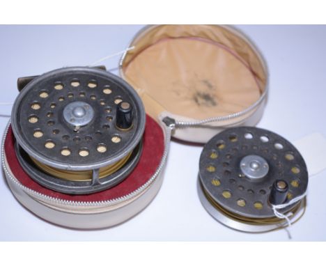 Walker Bampton Makers, Alnwick: a vintage 3 1/2in. alloy fly fishing reel, fitted rim tensioner, black handle and plain brass
