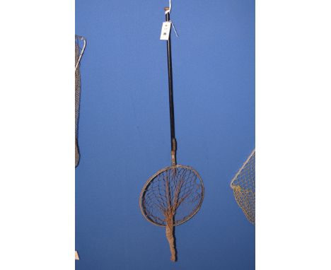 A vintage folding landing net.