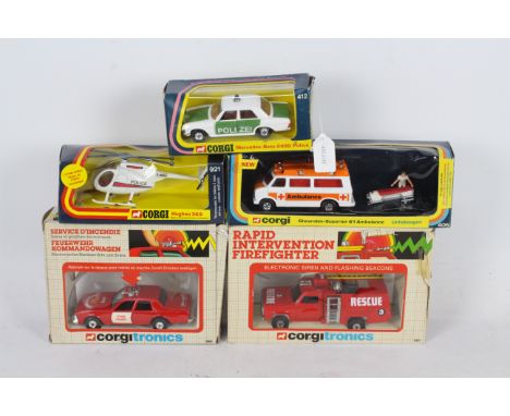 Corgi - Five boxed diecast model vehicles from Corgi. Lot includes Corgi #405 Chevrolet Superior 61 Ambulance; 412 'Polizei' 