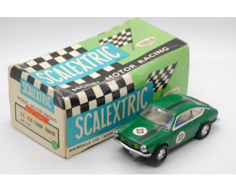 Scalextric Exin (Spain) - A boxed Scalextric Exin C-42 'Race Tuned' TC 850 Coupe Abarth. The model in green with white interi