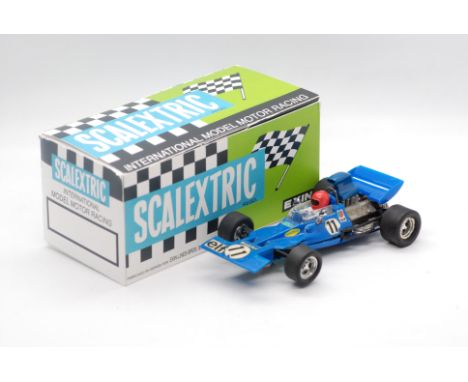 Scalextric Exin (Spain) - A boxed Scalextric Exin C-48 Tyrell Ford. The model in blue with RN11 marked 'Made in Spain' to bas