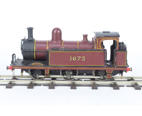 Unknown Maker - A powered brass O gauge kit built 3 rail 0-6-0 Class 1F tank engine. It shows signs of age and use and would 