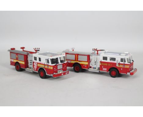 Code 3 Collectibles - 2 x unboxed limited edition Fire Trucks in 1:64 scale in FDNY livery, Squad Company 1 is a 1992 Seagrav