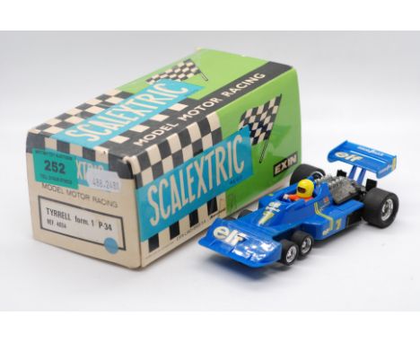 Scalextric Exin (Spain) - A boxed Scalextric Exin #4054 Tyrell F1 P-34. The model in blue with RN7, driver with pale gloves,m