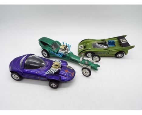 Hot Wheels - Gran Toros - 3 x unboxed 1:43 scale cars, McLaren M8D, Silhouette and Trantula. They all show light signs of use