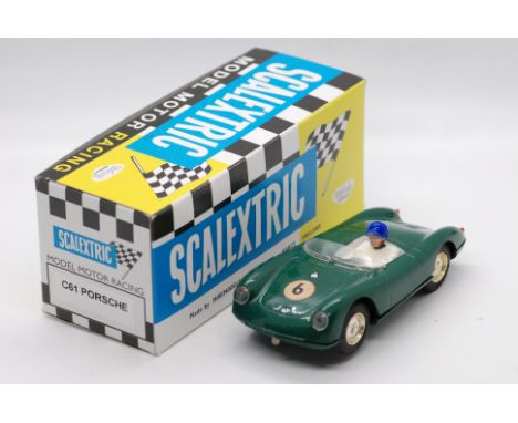 Scalextric - A boxed vintage Scalextric C.61 Porsche Spyder in racing green bearing RN6  decal to bonnet, with green tonneau,