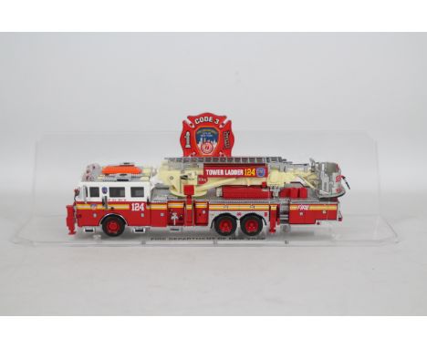 Code 3 Collectibles - A limited edition 1:64 scale Aerialscope Tower Ladder number 124 Tonka Truck in FDNY livery # 12735. Th