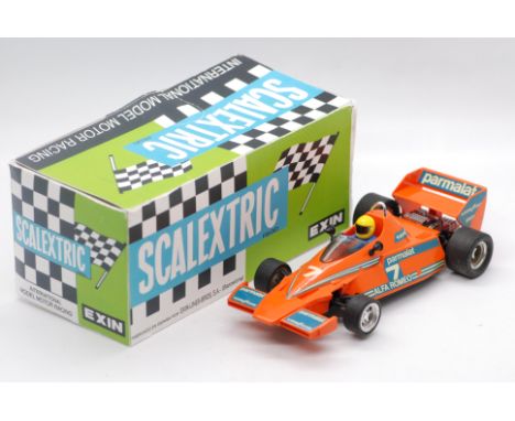 Scalextric Exin (Spain) - A boxed Scalextric Exin #4056 Brabham BT-46. The model in orange with RN7, marked 'Made in Spain' t