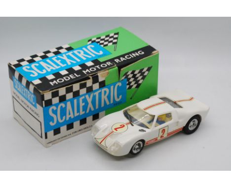 Scalextric Exin (Spain) - A boxed Scalextric Exin C35 Ford GT. The model in white with RN2 decals, marked 'Made in Spain' to 