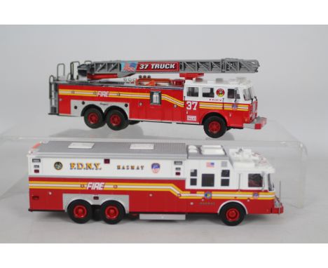 Code 3 Collectibles - 2 x unboxed models in FDNY livery 1:64 scale, a Saulsbury Hazmat Unit with extending roof light # 12705