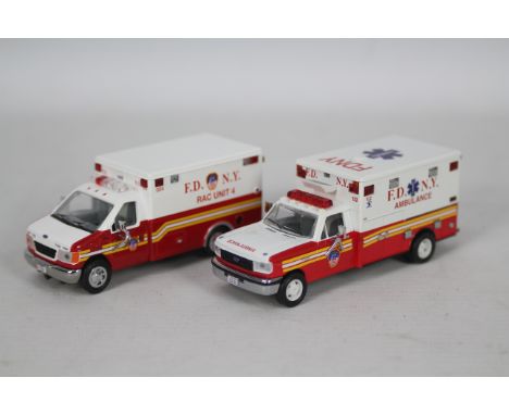 Code 3 Collectibles - 2 x limited edition FDNY Ambulance models in 1:64 scale, a Ford E350 RAC Unit 4 # 12068 which is one of