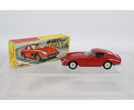Dinky - A boxed Ferrari 275 GTB # 506. This French made model appears in Very Good condition with only minor paint marks and 